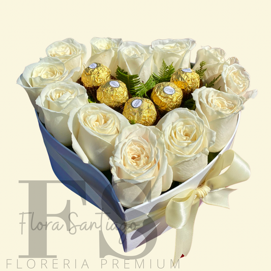 Caja corazón con rosas blancas y bombones de chocolate