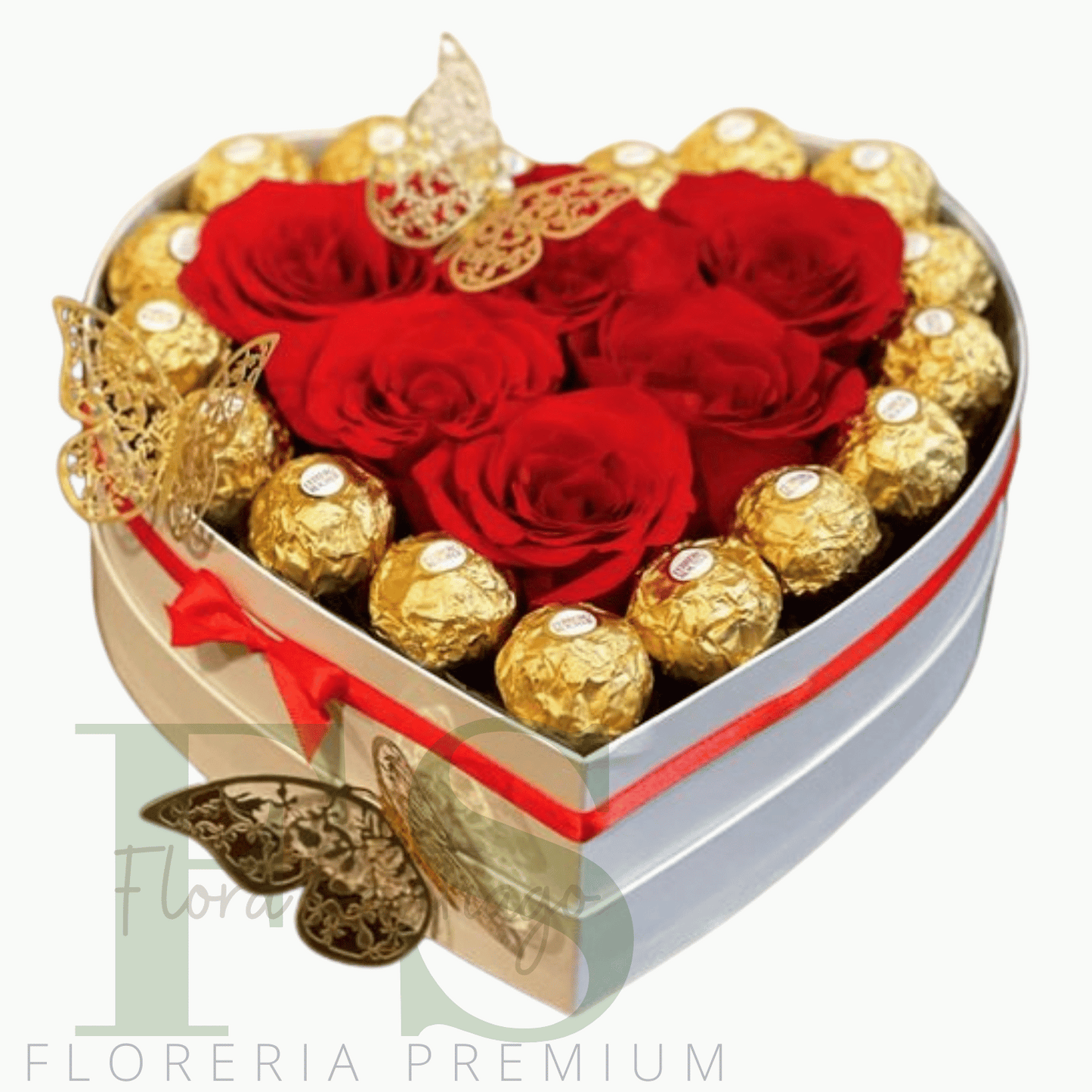 arreglo caja corazón que incluye 16 exquisitos bombones de chocolate y complementada con 6 hermosas rosas rojas.